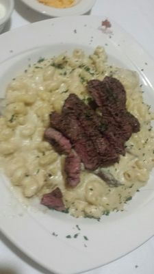 Steak cavitappi minus tomatoes. Good flavor to the steak. I didn't ask for a specific temp. They did good, Imo.