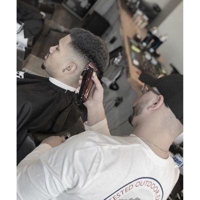 Our barber CJ executing a bald fade.