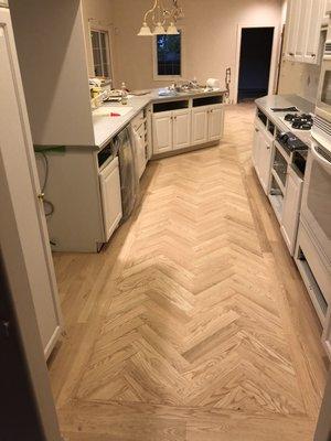 Herringbone Pattern Wood Floor Installation