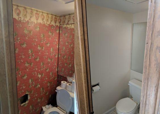 In just two and a half days, we removed the old wallpaper, refinished the wall with new paint and trim, and plus a toilet paper dispenser!