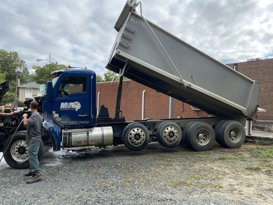 Washing dump truck