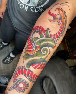 Snake going through cactus heart by Pablo