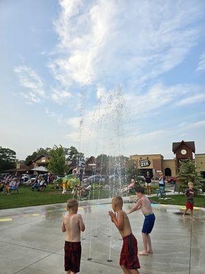 The kids splash zone in Crosslake Town Square is the perfect spot to play and cool off on a hot summer day