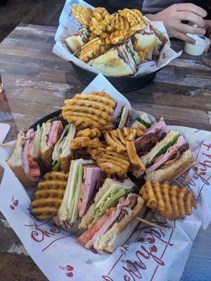 Club sandwich and waffle fries