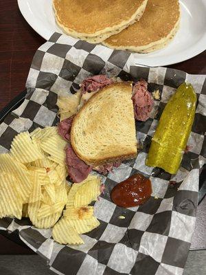 reuben with side chocolate chip pancakes