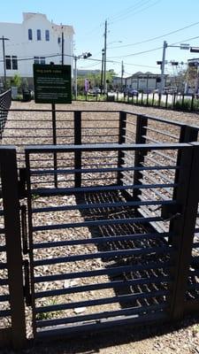 Double gate entrance into leash free area. Helps dog not run away when someone else leaves or enters