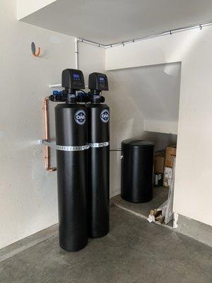 Catalytic Carbon conditioner & water softener with matte black tank jackets. Installed in La Habra CA