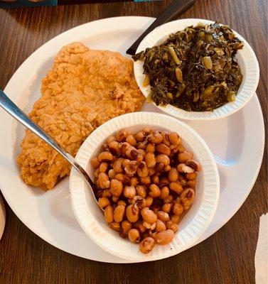 Fried pork tenderloin, black eyed peas and turnip greens.