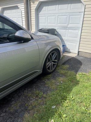 Another view of the front of the vehicle basically just sitting on the wheel.