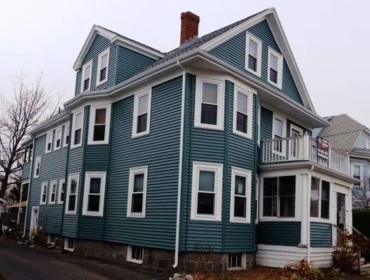 After with new windows and vinyl siding.