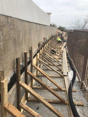 Custom pool retaining wall repair.