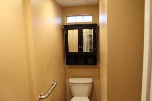 This powder room was built into space that was previously part of the backyard of a row home.