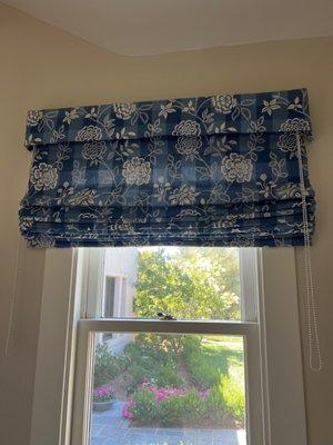 Roman shades should have been made to fit casing vs. extending beyond