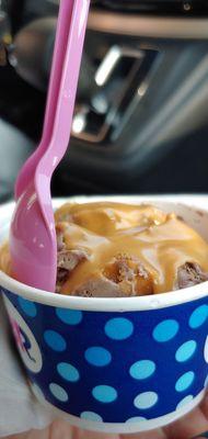 Peanut butter chocolate ice cream with Reese's peanut butter sauce on top!