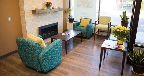 A welcoming reception area to relax, grab a drink, and read a magazine.