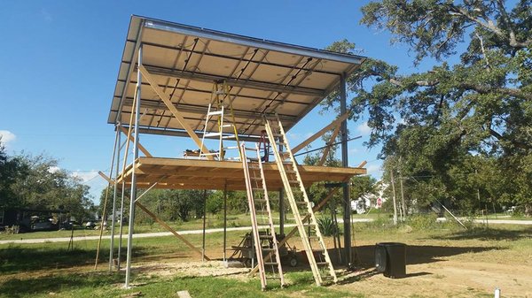 This solar project, the customer requested the structure to be 2-story so they could build a residence w/ office.