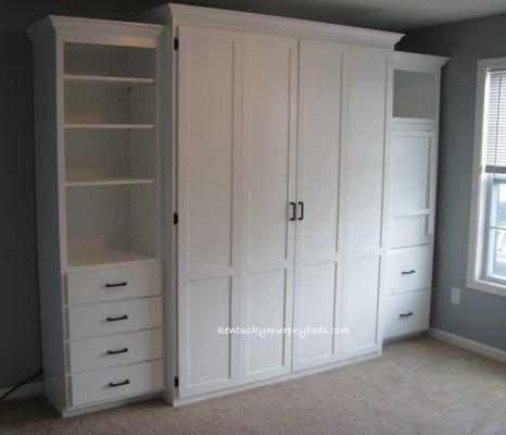 Queen size Murphy bed with fold down desk, 2 file drawers, 4 drawer base book case painted white.