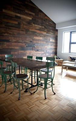 6' Industrial Style Table. Solid wood top stained Dark Walnut with Industrial metal pedestal base.