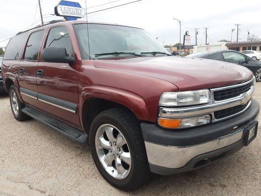 Dozens of awesome SUVs,like this Chevy Suburban goin for only $3995