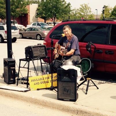 listening to live blue grass music while getting some fresh vegetables and fruits - come and support your local growers!