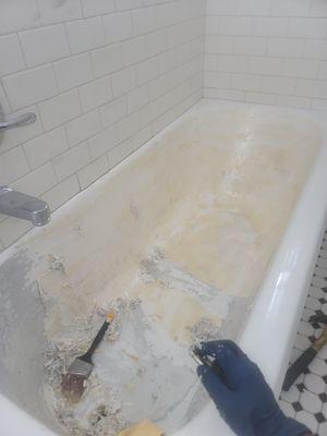 Stripping old finish from tub and getting ready for a new coat