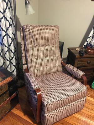 Re-upholstered rocker-recliner