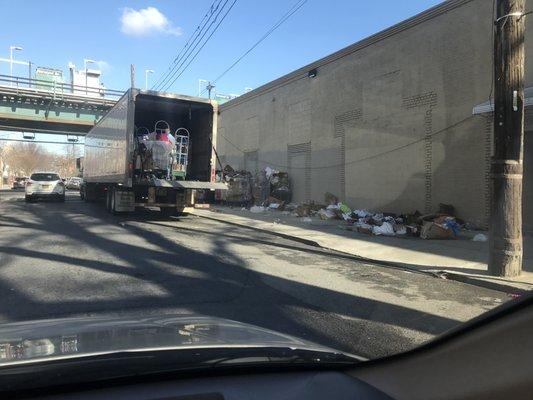 Garbage all over the side walk courtesy of Family Dollar.