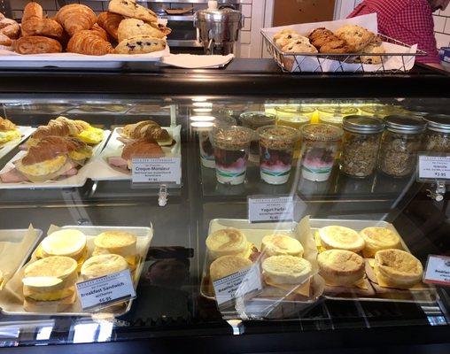 Nice selection of breakfast sandwiches (which get heated on the panini press ), pastries, parfait and granola.