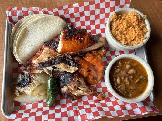 Half Chicken with rice & beans.