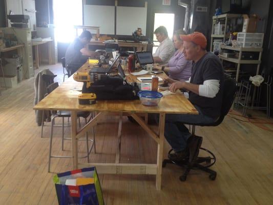 A collaborative workspace. Makerspace coworking space for entrepreneurs and technology social club