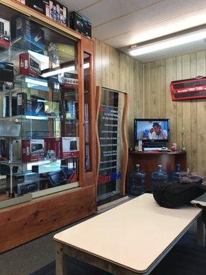 Tv in the air conditioned waiting room. 5 chairs, water jug, bathroom.