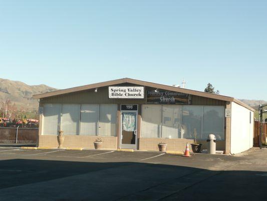 unassuming architecture,but with a view of the mountains