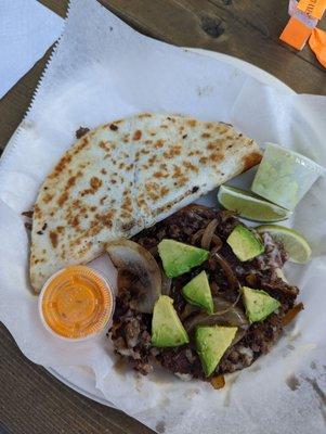 El dorado quesadilla ($9.50) and taco