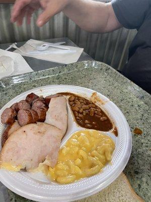 Smoked Turkey, hot links, beans & Mac n cheese