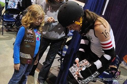 Penni Pusha signs autographs