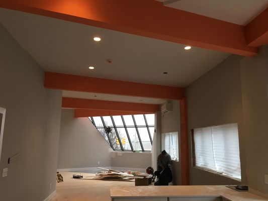 Nice accent color for this beamed ceiling