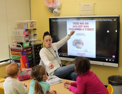 Child's Voice speech therapist uses a SMART board with students.