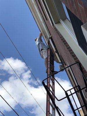 Painting a Cornice in East Passyunk