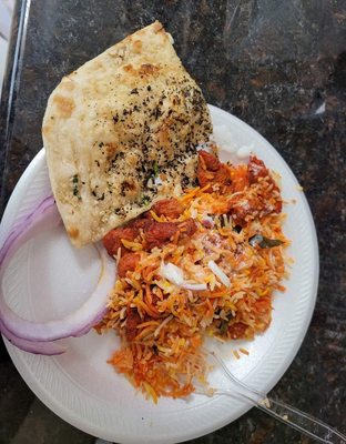 Chicken biryani with basil garlic naan