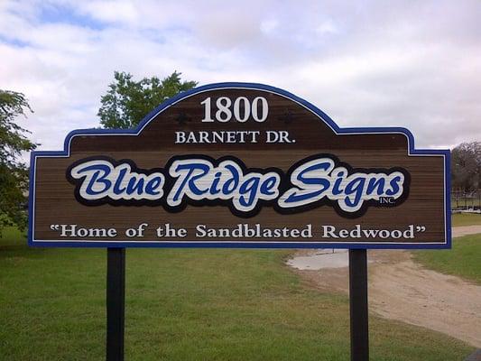 Home of the Sandblasted Redwood Sign