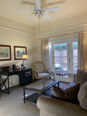 Living room that opens to the private patio