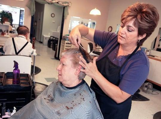 Owner Molly Campbell cuts hair