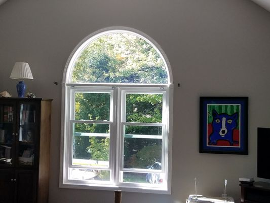 Soft lite replacement windows with new arch glass. Interior trim left untouched.