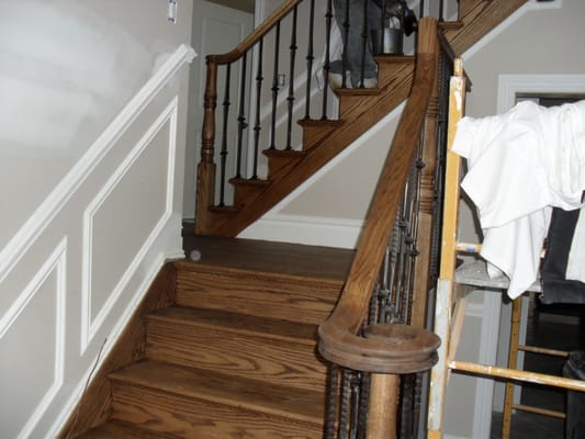 stairs and rails being stained and finished