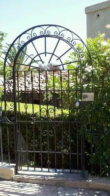 Gate entry. Keypad, intercom, camera, and door strike.