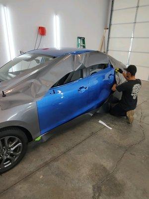 Ramon wrapping a car