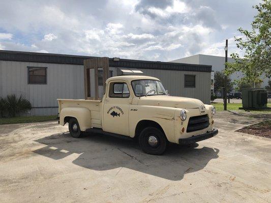 Beaver Street Fisheries Antique Truck marking entrance