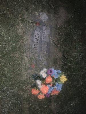 Graves covered with grass and debris after we regularly clean ourselves