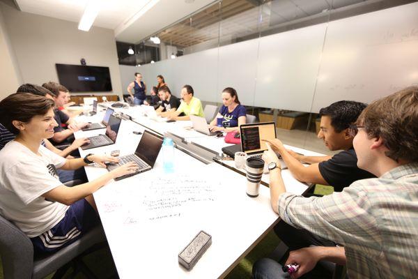 Picture of our coding school using Capital Factory whiteboarding tables