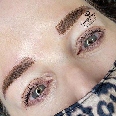 Hair-like strokes drawn on the eyebrows with Microblading Technique by RizArtistry